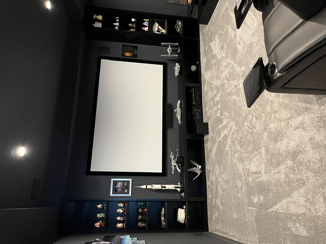 JVC projector installed in custom home theater